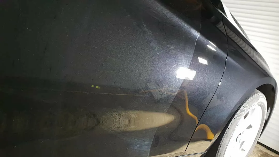 BMW 3 Series undergoing paint correction and ceramic coating treatment