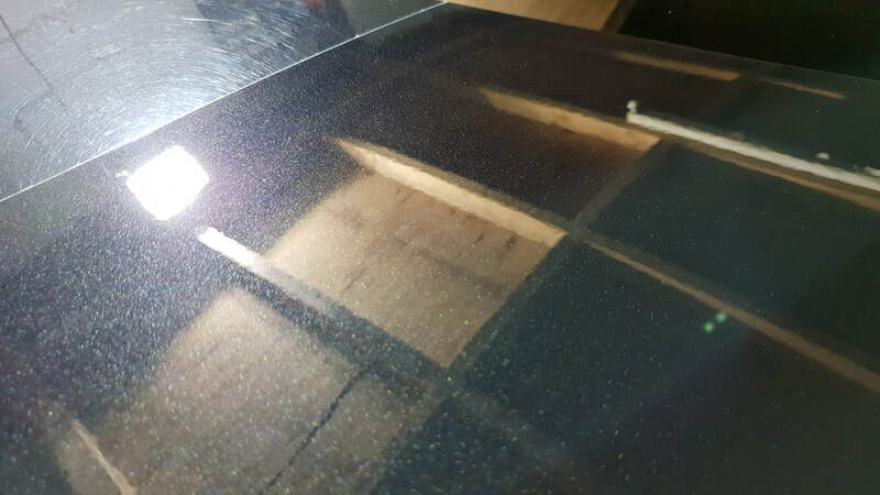 BMW 3 Series undergoing paint correction and ceramic coating treatment