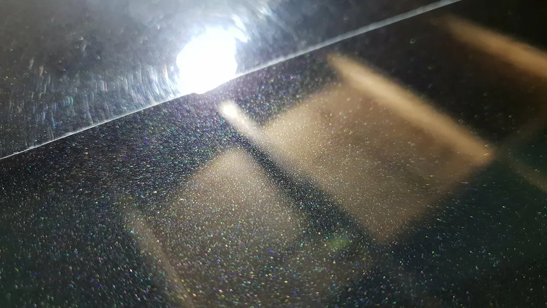 BMW 3 Series undergoing paint correction and ceramic coating treatment