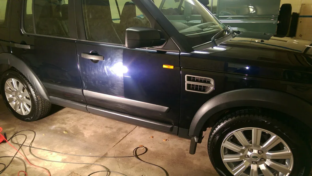 Land Rover Discovery undergoing paint correction and ceramic coating treatment