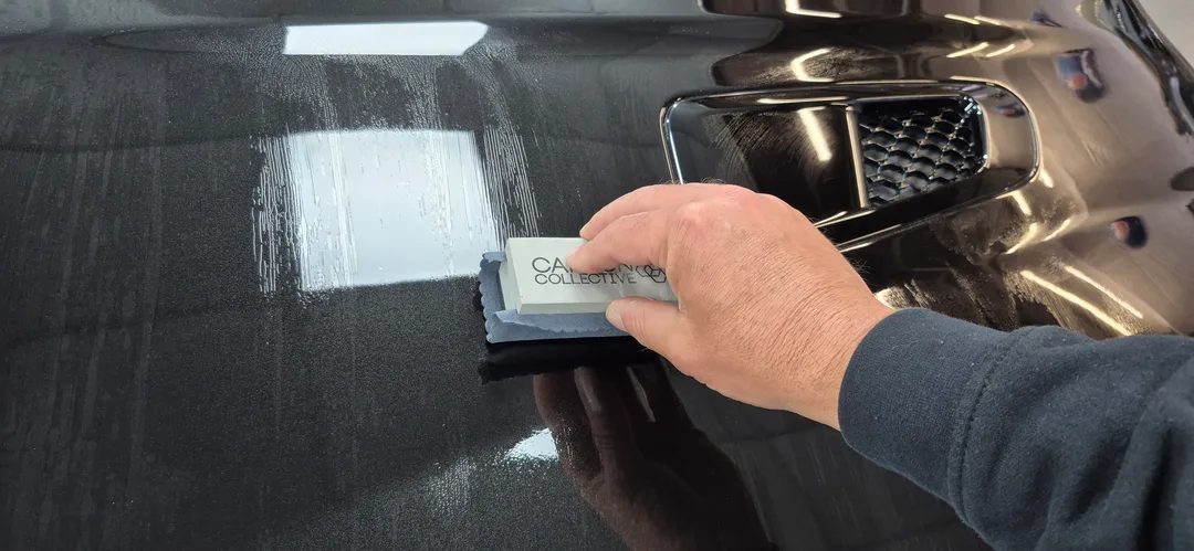 Feynlab V2 ceramic coating being applied to Jaguar F-Type bonnet