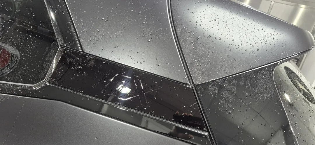 BMW iX M70 quarter panel before drying