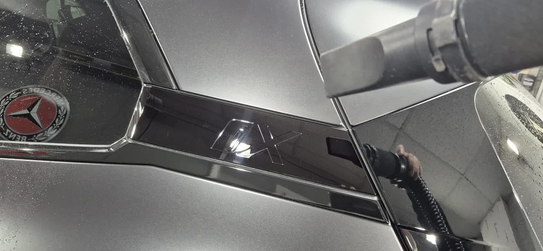 BMW iX M70 quarter panel during drying