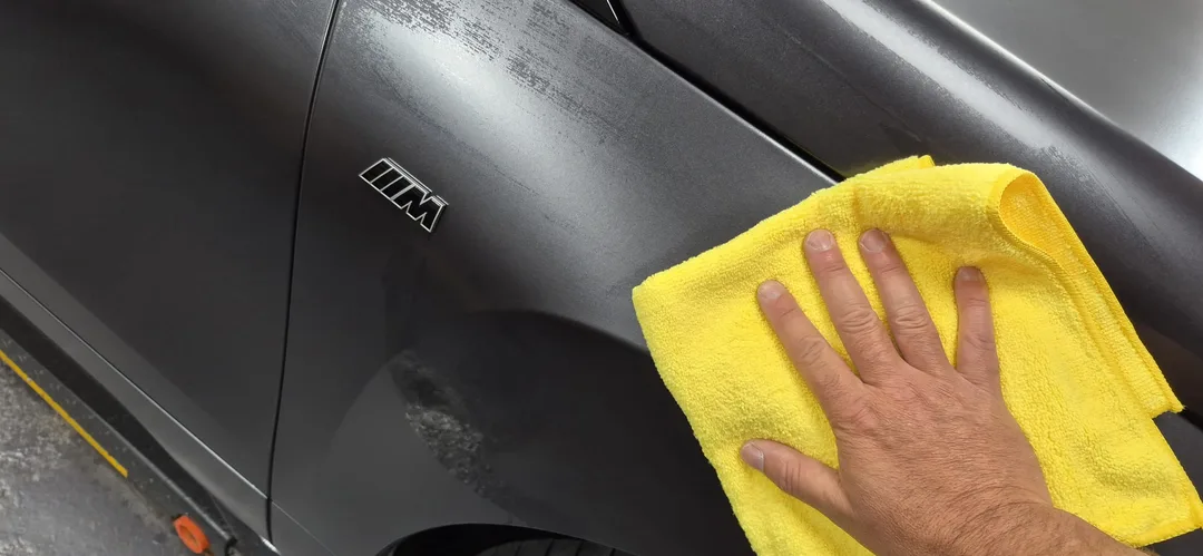 Panel wipe being used on wing to prep paintwork prior to Matte ceramic coating