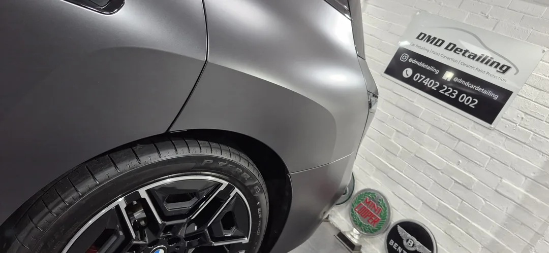 BMW iX M70 rear quarter after matte paint protection detail